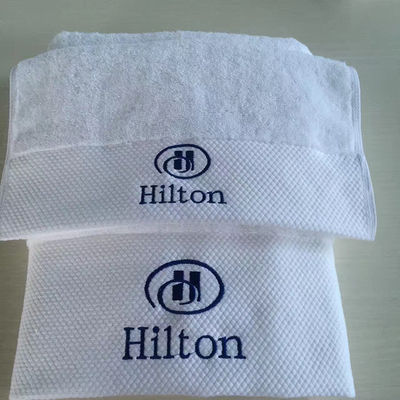 Tecido de algodão 100% cor sólida logotipo personalizado Toalha de banho para banheiro de hotel de luxo