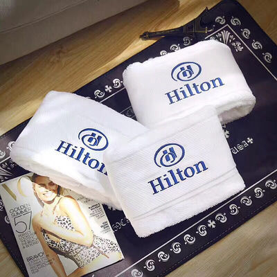 Tecido de algodão 100% cor sólida logotipo personalizado Toalha de banho para banheiro de hotel de luxo