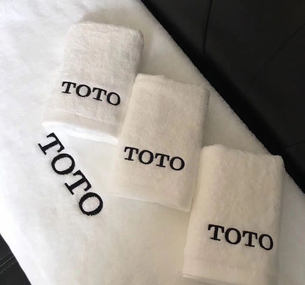 Tecido de algodão 100% cor sólida logotipo personalizado Toalha de banho para banheiro de hotel de luxo