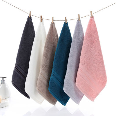 Melhore a sua experiência de spa com uma toalha de algodão de cor sólida de 34*34cm