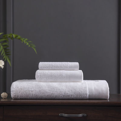 Toalha de banho de algodão branco de alta qualidade perfeita para hotel de cinco estrelas e salão de beleza