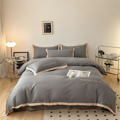 2023 Estilo Grau A 100% Algodão 4pcs Set de roupa de cama com processo de combinação de canto bordado