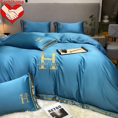 Seal quente customizado H bordado de seda lavada quatro peças de roupa de cama para todas as estações