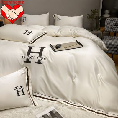 Seal quente customizado H bordado de seda lavada quatro peças de roupa de cama para todas as estações