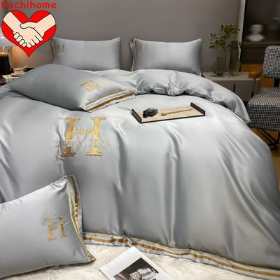 Seal quente customizado H bordado de seda lavada quatro peças de roupa de cama para todas as estações
